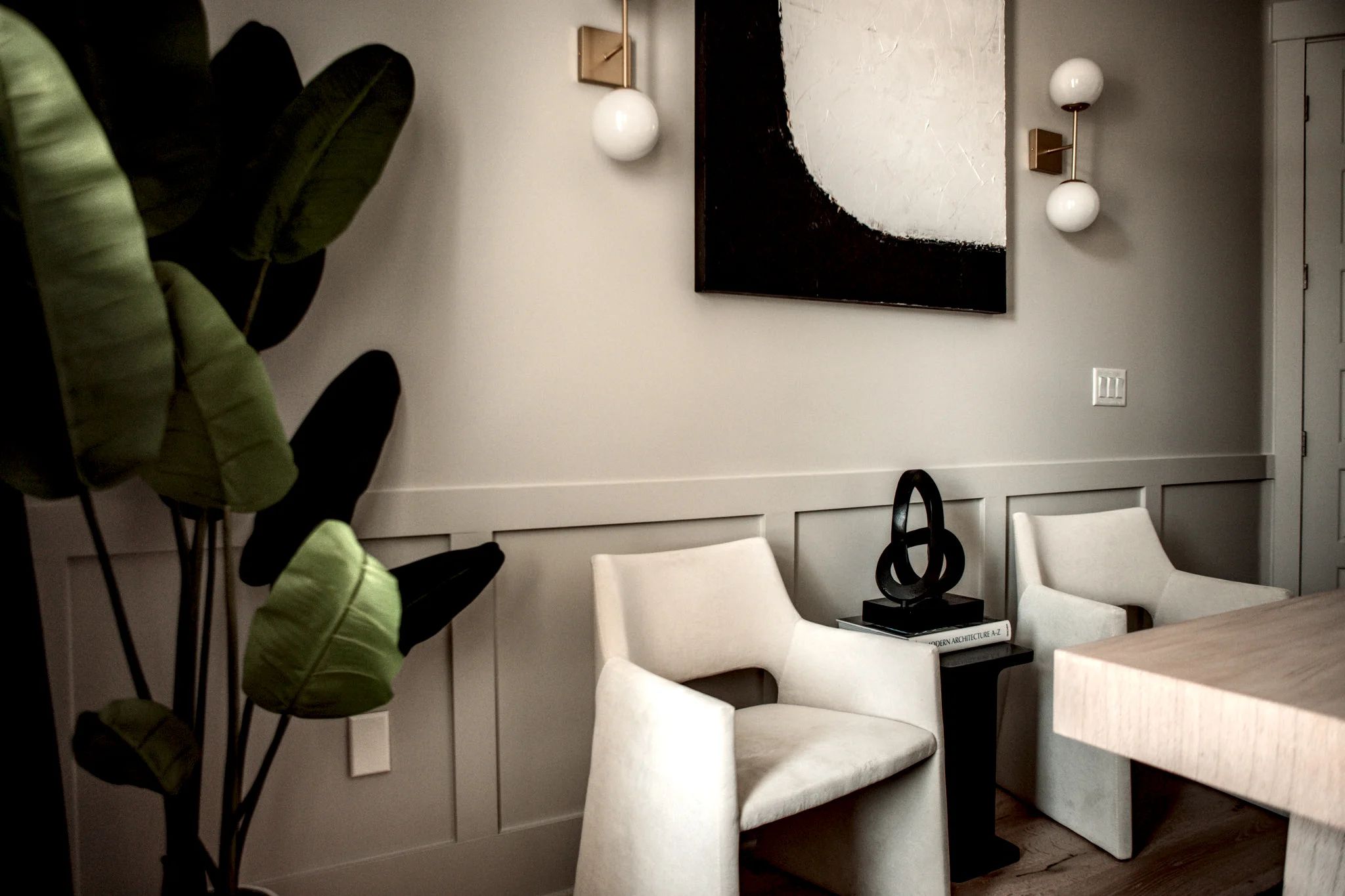 chic office with leather chairs and plants